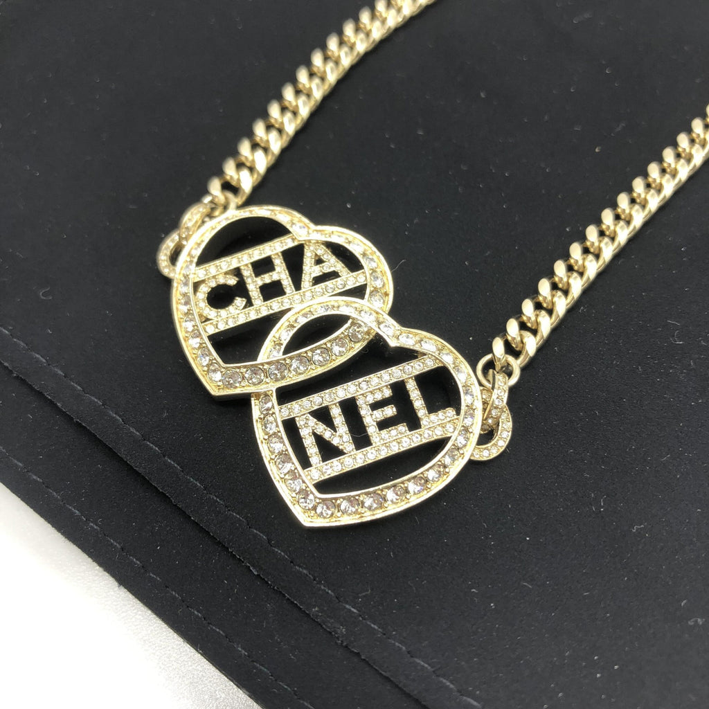 Gold Tone Heart Choker Necklace With Logo