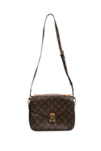 Pochette Métis Monogram