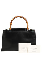 Nymphaea Bamboo Top Handle Leather Bag